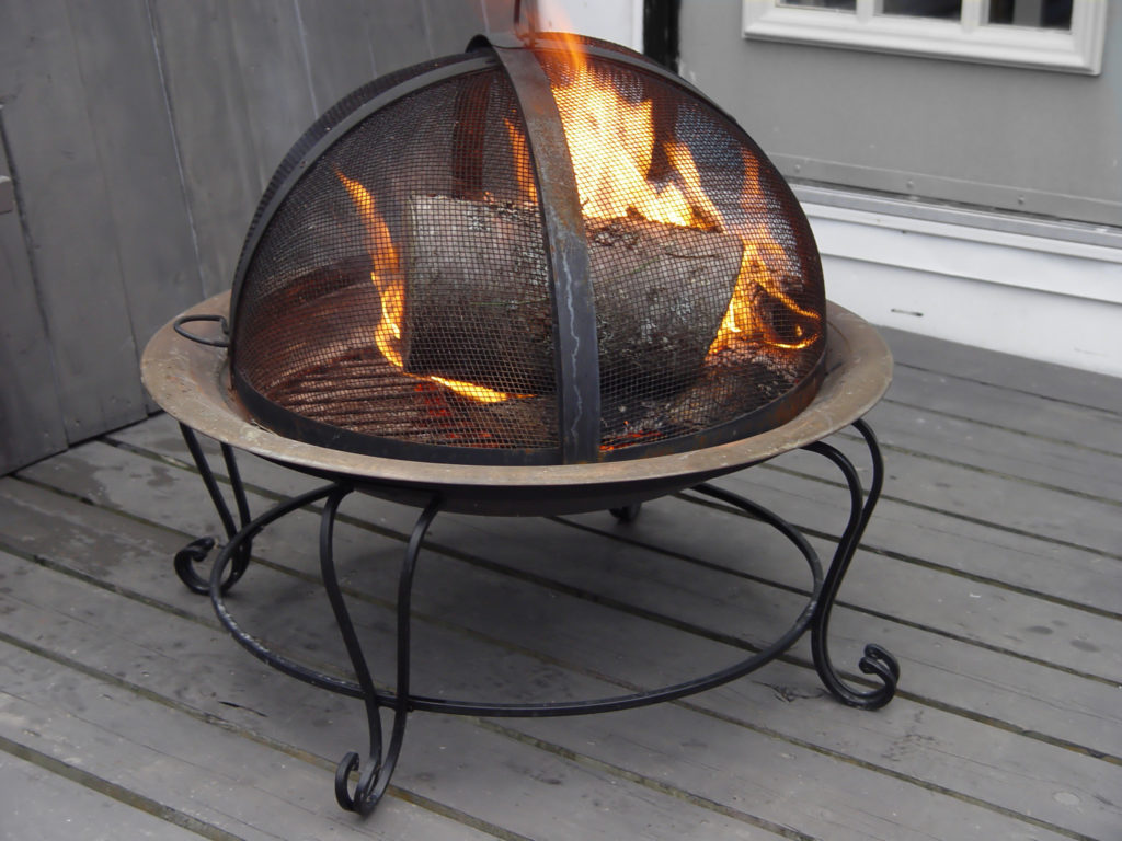 fire pit on a wood deck
